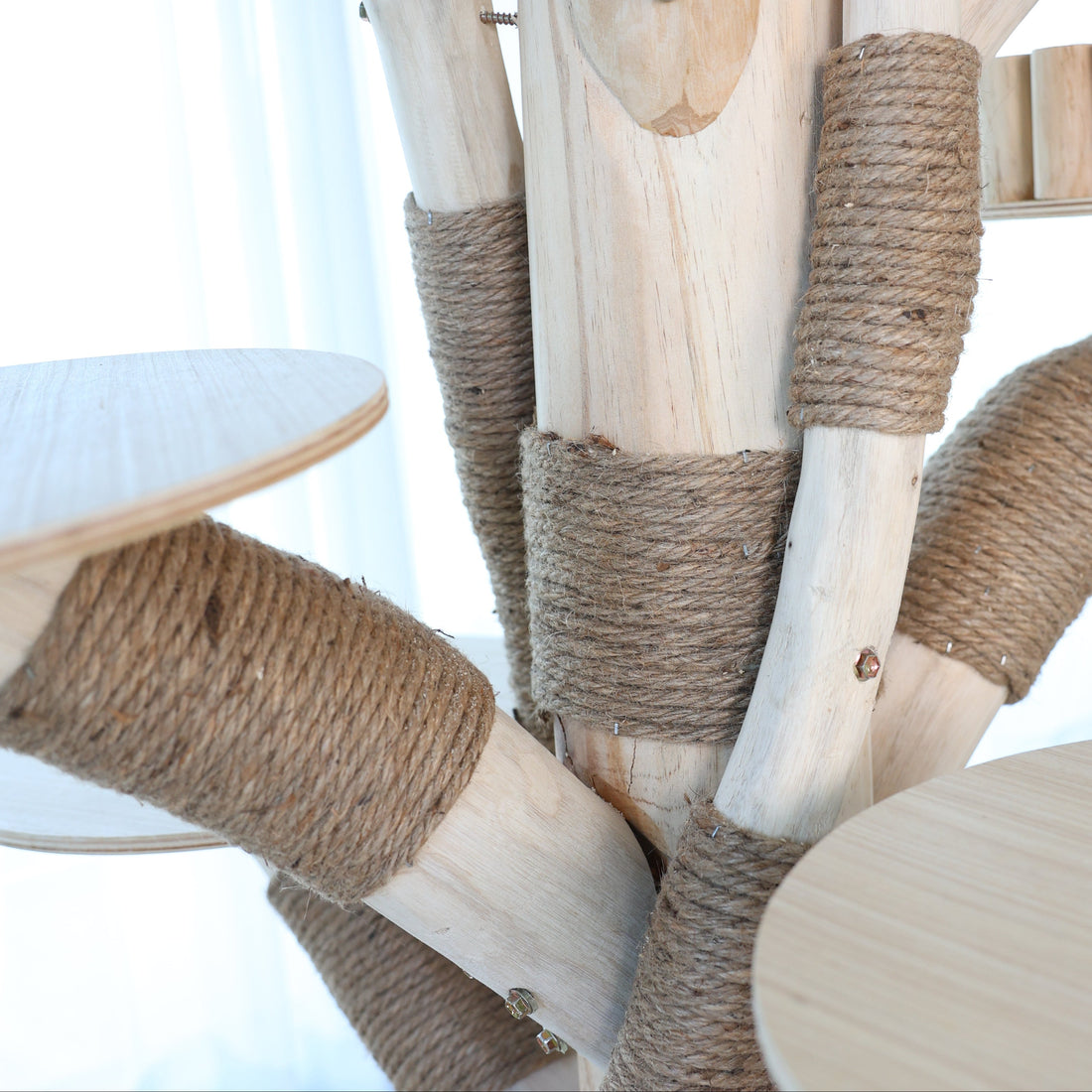 Natural sisal scratching post for healthy scratching behavior.